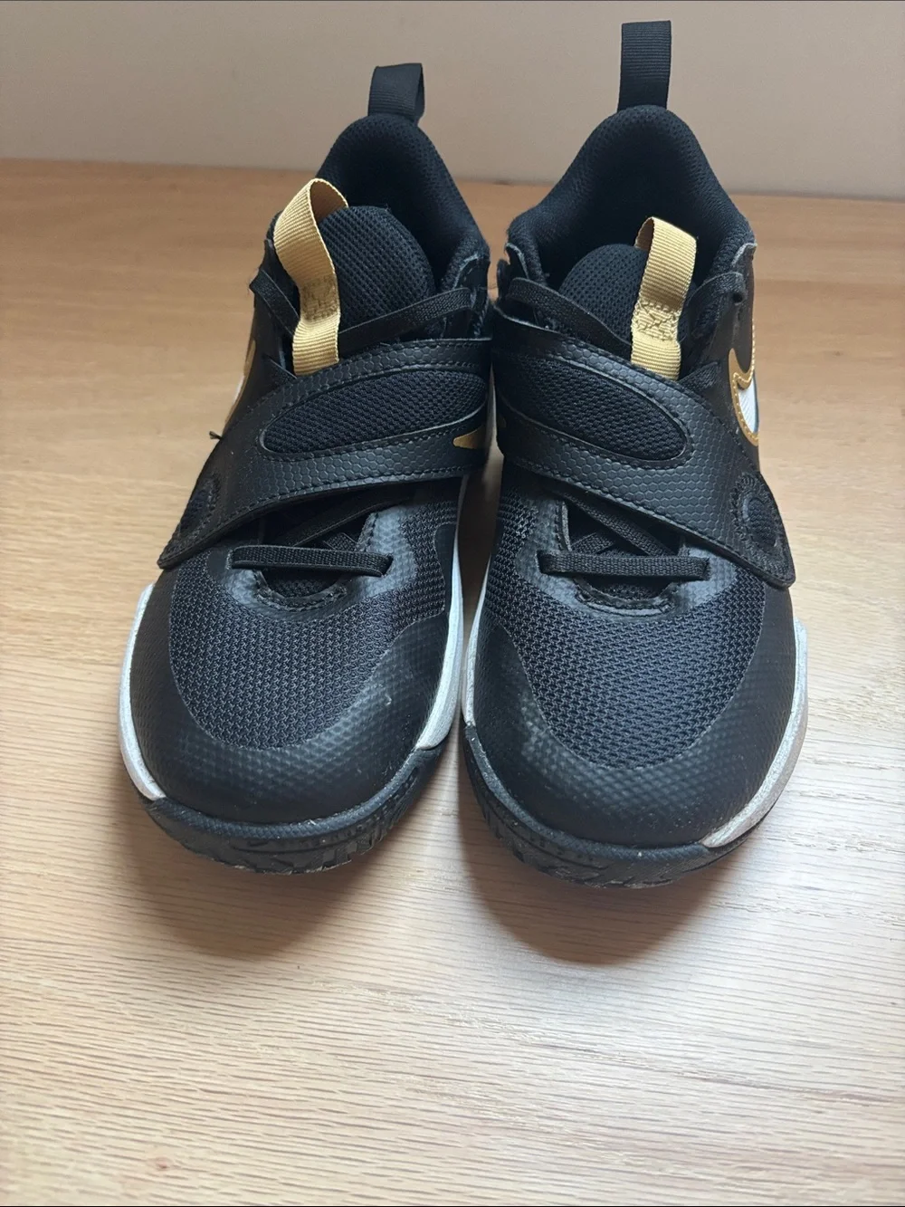Nike Kids Black and Gold Basketball shoes